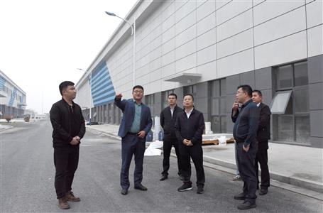 覃振華到江蘇、安徽兩地調研市場經營